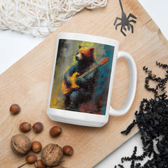 String Serenade White Glossy Mug on a wooden table surrounded by musical notes.