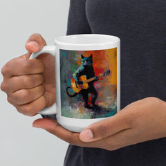 Strumming Sensation glossy mug filled with coffee, ready to inspire