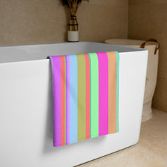 Velvet Touch Stripe Bath Towel in elegant color gradient, showcasing plush texture and durable edges.