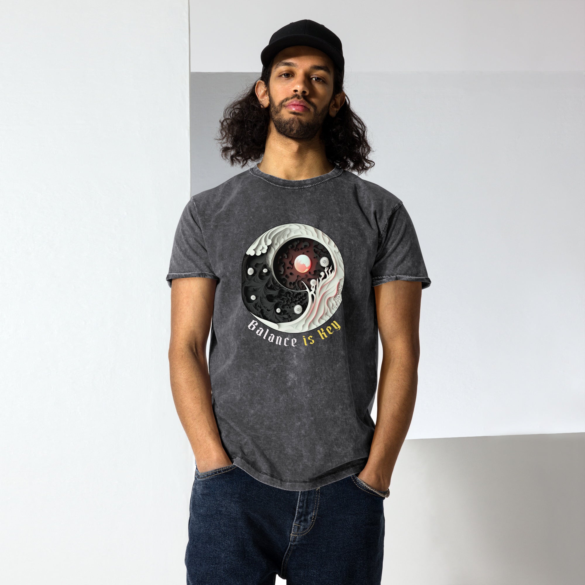 Stylish feathered artwork on a comfortable denim tee.