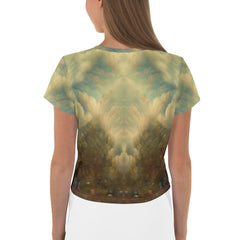 Woman wearing United We Thrive crop top with vibrant print