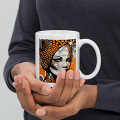 Close-up of Visual Velocity white glossy coffee mug.