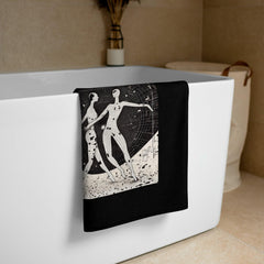 Elegant Whimsical Balletic Fashion Towel draped over a minimalist bathroom rack.