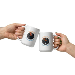 Dual-themed Night and Day coffee mug in glossy white.