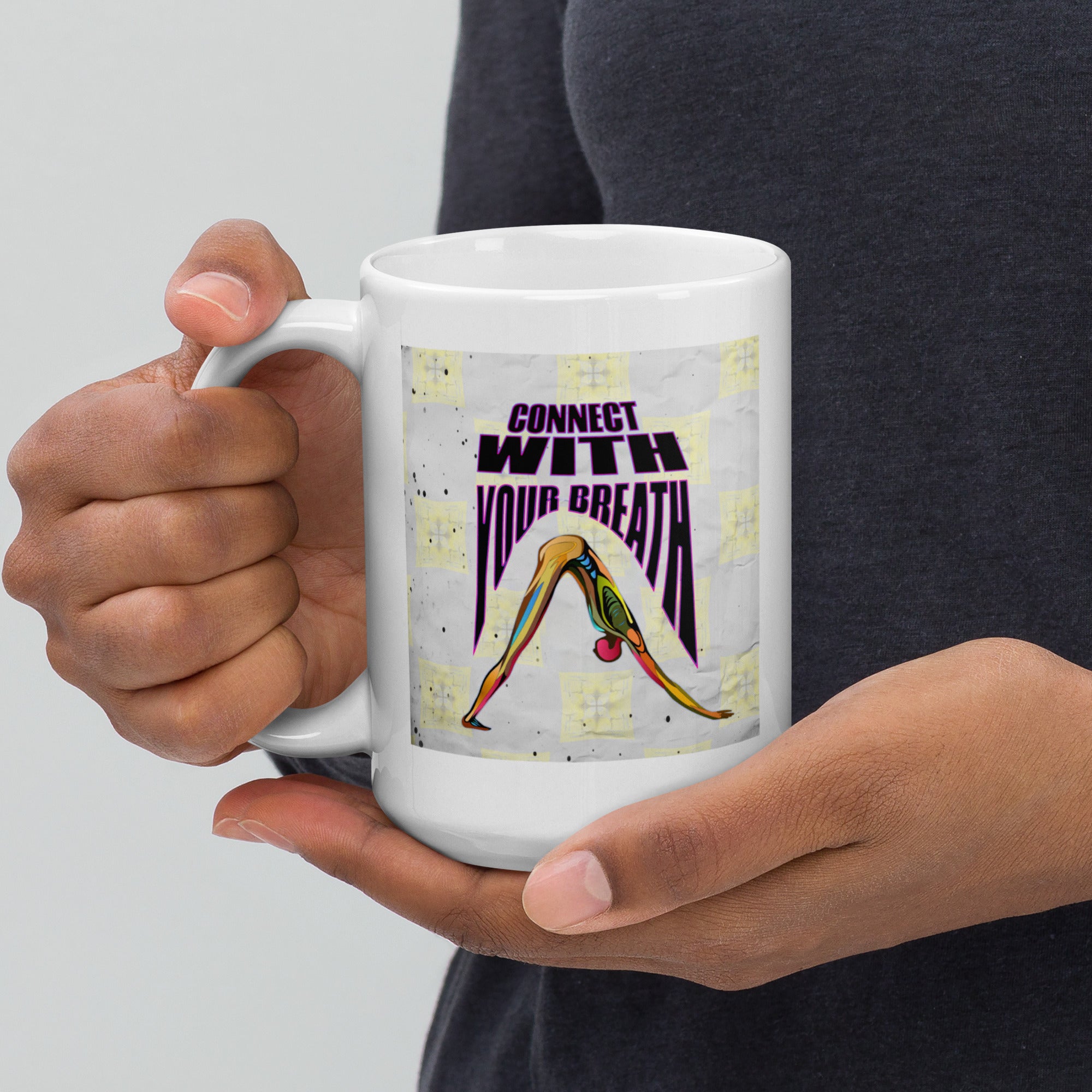 Sharp focus Triangle Pose on a white glossy mug.