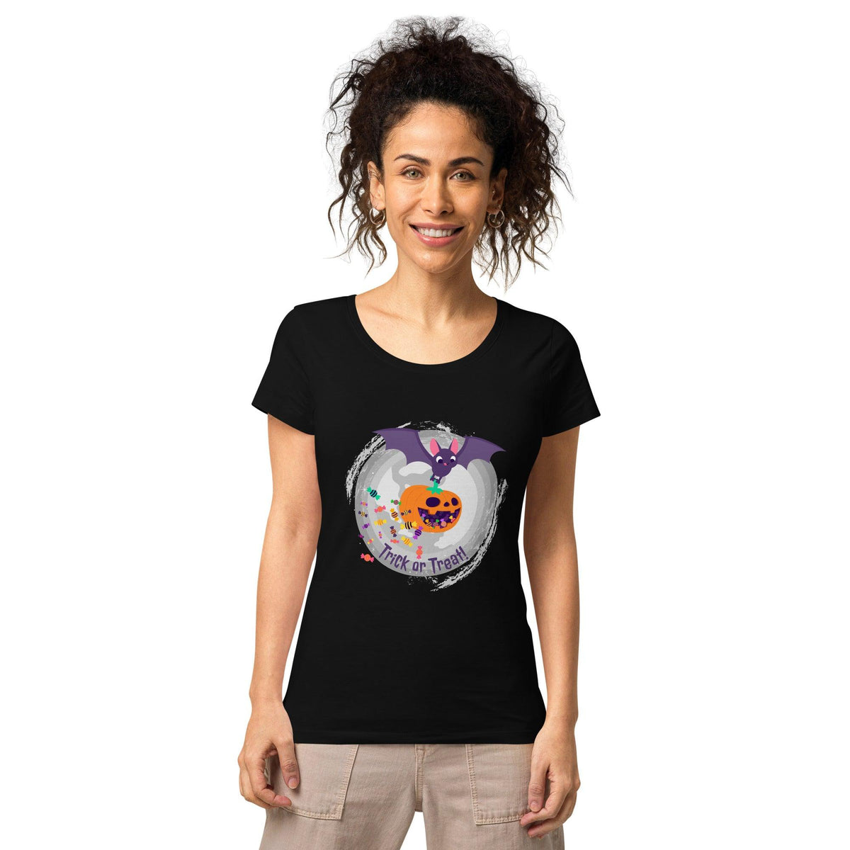 Woman wearing Halloween Magic Organic T-Shirt, showcasing the enchanting design and eco-friendly material.