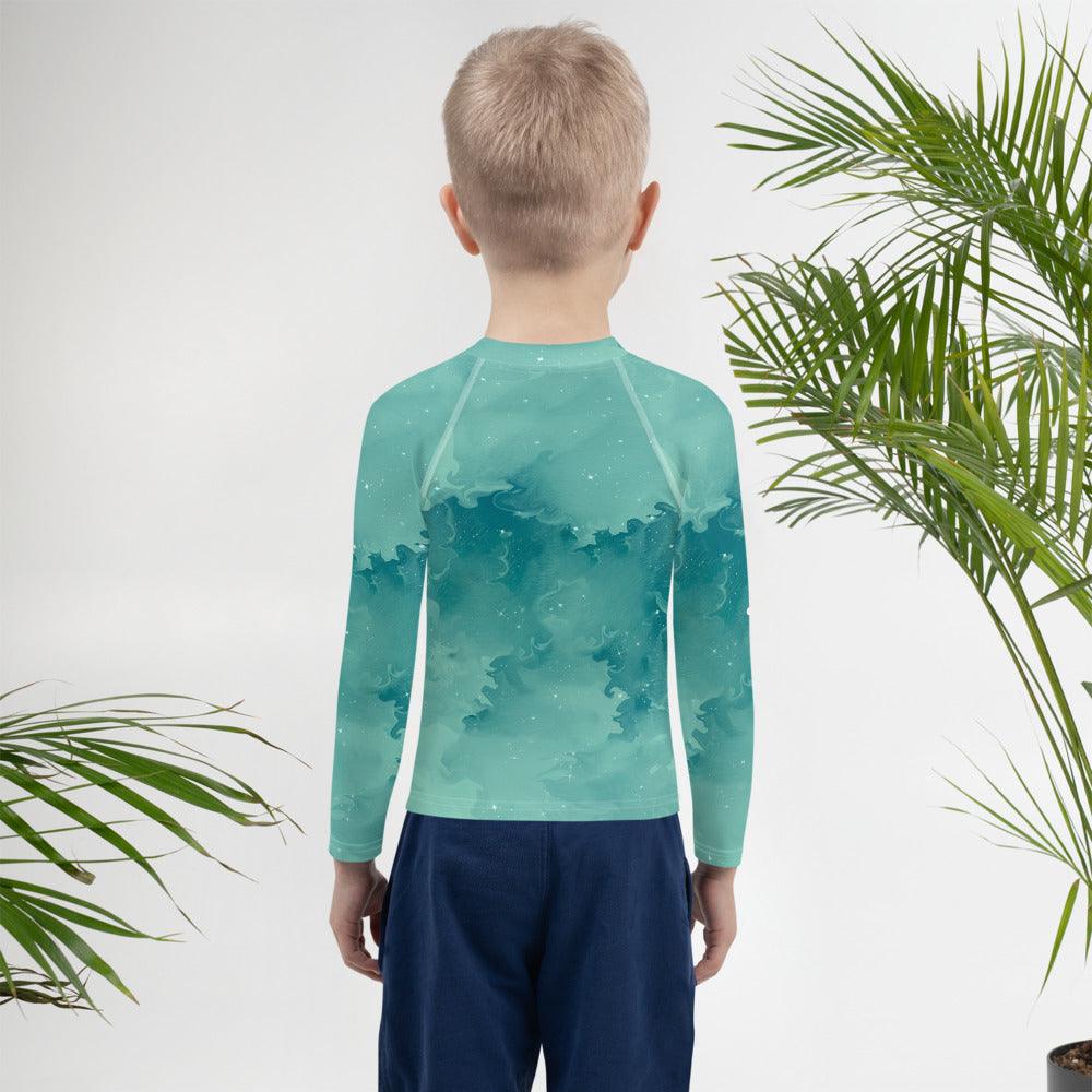Child enjoying water activities wearing the protective Wondrous Childlike Gaze Rash Guard.