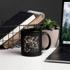 Close-up of black glossy mug with "Stronger Every Day" motivational quote